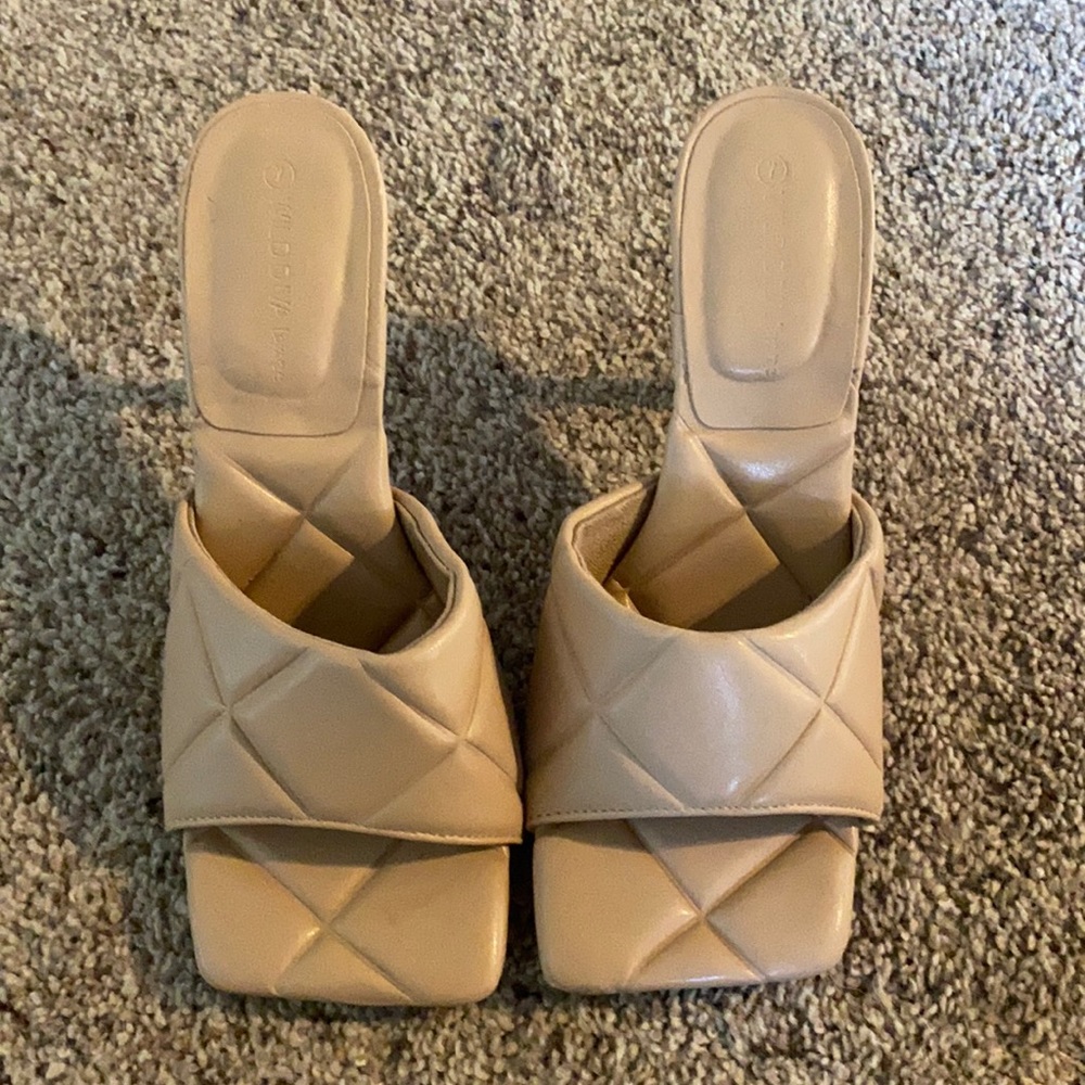 Taupe slip on heels . Size 7 .